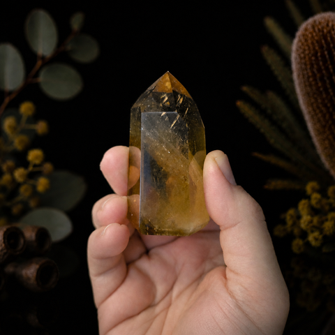 Polished natural Citrine crystal generator with golden honey tones and radiant mineral clarity