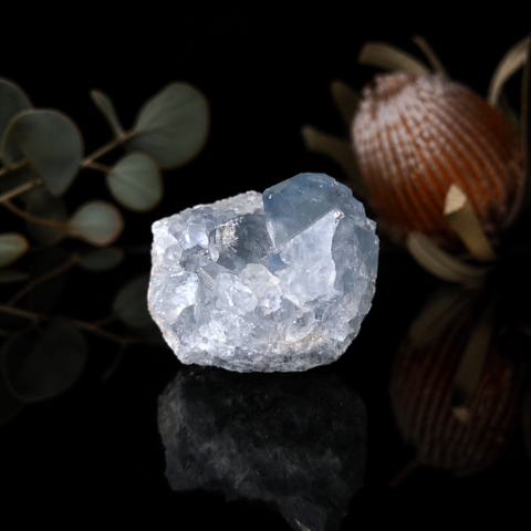 Natural blue Celestite crystal cluster with sparkling sky-blue mineral formations